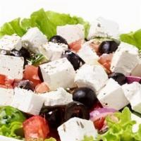 Greek Salad · Hearts of romaine, diced tomatoes, red onions, cucumbers, kalamata olives, feta cheese.