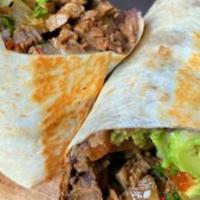 Brick Burrito · Flour tortilla, Mexican rice, refried beans, pico de gallo, avocado, Monterey cheese, and yo...