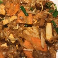 Pad Thai · Stir-fried thai rice noodles with egg, tofu, green onions, carrots, and bean sprouts with sw...