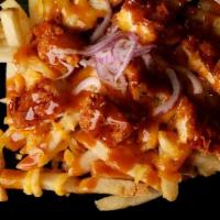 Loaded Fries · Fries topped with diced hot chicken, shredded cheese and blazin honey sauce