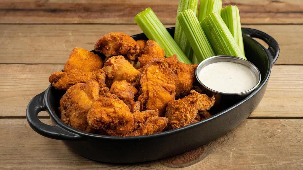 Wings Boneless Hot Dry Rub · crispy buttermilk marinated boneless wings, celery,. smoked onion ranch (280 cal) or house-made blue cheese dressing (250 cal),