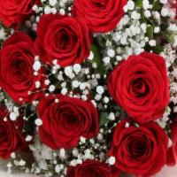12 Red Roses Vase  · 12 long stem red roses arranged in a vase with fillers and greens.
Add a card for $4.99
or a...