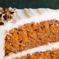 Carrot Cake Delicious · Homemade healthy with vanilla icing. Sweet, moist full of cut carrots, toasted nuts and cove...