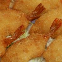 Fried Shrimp · Golden crispy fried shrimp cooked to perfection. served with macaroni salad and choice of br...