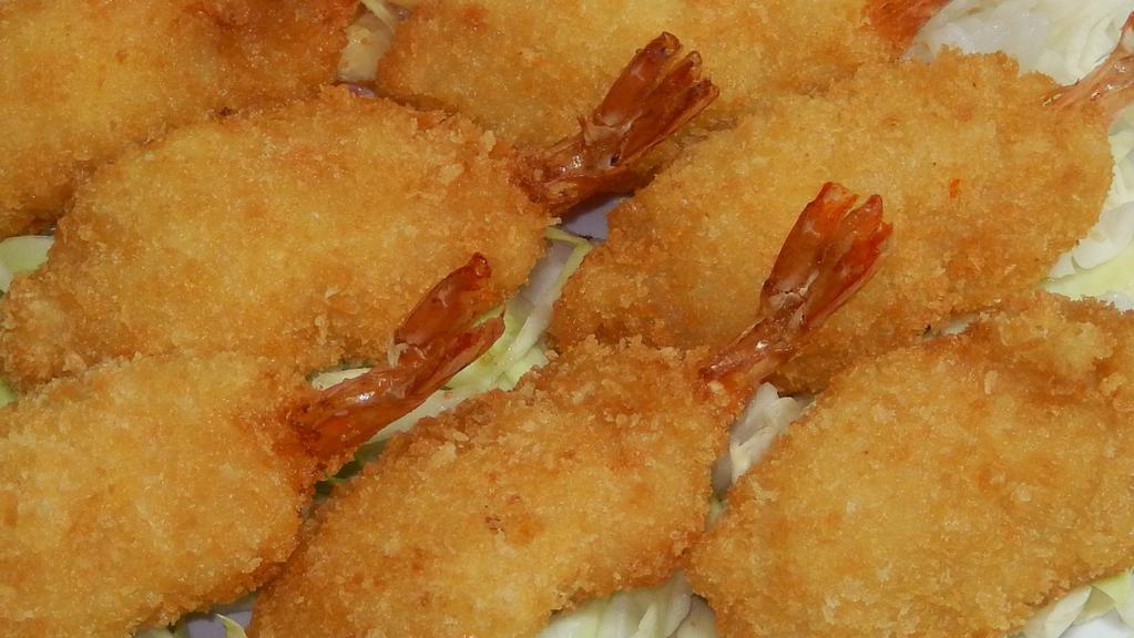 Fried Shrimp · Golden crispy fried shrimp cooked to perfection. served with macaroni salad and choice of brown rice or white rice.