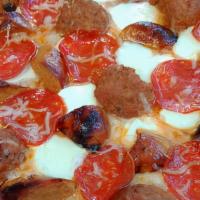 Meat Lovers Pizza (Tomato Sauce, Mozzarella, Italian Sausage, Meatballs, And Pepperoni) · Tomato sauce, mozzarella, Italian sausage, meatballs, and pepperoni.