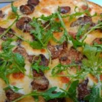 Mushroom Truffle Pizza (Tomato Sauce, Sauteed Mushrooms, Parmesan, Truffle Oil, And Arugula) · Tomato sauce, sauteed mushrooms, parmesan, truffle oil, and arugula.