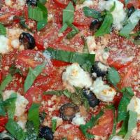 The Greek Pizza (Tomato Sauce, Cherry Tomatoes, Feta, Olives, Basil, And Parmesan) · Tomato sauce, cherry tomatoes, feta, olives, basil, and parmesan.