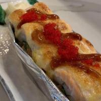 Lion King Roll · Snow crab and avocado topped with baked salmon, masago and our delicious baked sauce.