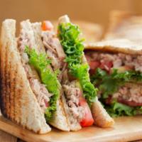 Tuna Sandwich · Fresh tuna mixed with creamy mayo, salt and
pepper, lettuce, tomato, and delicious mayo
spre...