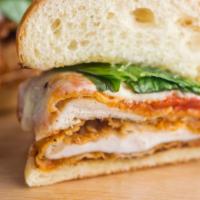 Turkey Breast & Provolone Sandwich · Yummy thinly sliced turkey on a sandwich with provolone cheese, lettuce, tomato, and and cre...