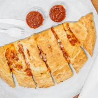 Buffalo Chicken Stromboli · Cheese and buffalo chicken.  With blue cheese or ranch  on the  side.