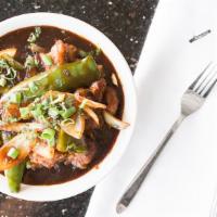 Chili Chicken · Spicy chicken with sliced green chilies in a garlic soy sauce.