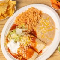 2 Cheese Enchiladas · Lettuce, cheese and sour cream on top , rice and beans on the side.