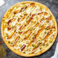 Chicken Ranch Pizza · Ranch drizzle, juicy chicken, mozzarella, marinara, basil, and extra virgin olive oil baked ...