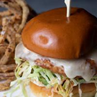 Crispy Chicken Sandwich · Coleslaw, pickles, olives, avocado, spicy aioli, Fontina cheese - fries.