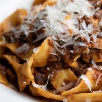 Fettuccine Bolognese · Beef ragu’ - tossed with butter in Parmigiano Reggiano cheese.