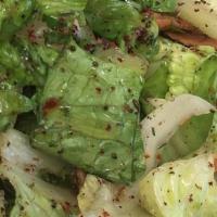 Fattoush Salad · Chopped tomatoes, green onions, parsley, cucumbers, romaine lettuce and toasted pita. Add pr...