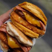 Wak’N’Bacon 2.0 · Beyond patty, FYH cheese, beleaf bacon, hash brown on two blueberry maple pancakes