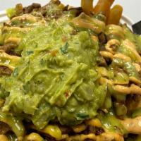Carne Asada Fries · Bean Curd “Asada” mixed with grilled onions & bell pepper, Not-Cho Cheese, Avocado sauce, ch...
