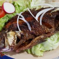Mojarra Frita / Fried Tilapia Fish · Fried tilapia fish