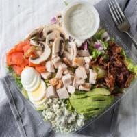 Chloes Cobb Salad · Mixed greens, turkey, bacon, avocado, onions, tomato, mushrooms, hard-boiled egg and bleu ch...