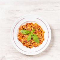 Tomato Basil Pasta · Tomato sauce garnished with parmesan cheese and fresh basil. Garnished with parmesan cheese.