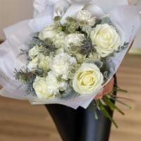 253 - White Roses, Carnations, Hydrangeas & Eucalyptuses · A tender hand-tied bouquet with white Roses, Carnations, Hydrangeas and Eucalyptuses.