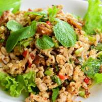 Larb · Choice of chicken, pork, or beef. Ground meat spiced with mint leaves, lime juice.