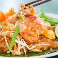 Pad Thai · Pan-fried thin rice noodles with egg, bean sprouts, and green onions topped with crushed pea...
