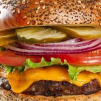 Classic Cheeseburger · USDA Choice beef, lettuce, onion, tomato with your choice of cheese