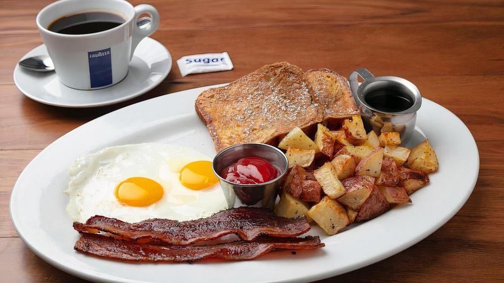 Breakfast Combo · 2 French Toast, 2 Organic Eggs Any Style with Applewood Smoked Pepper Bacon. Choice of Side.