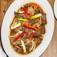 Mongolian Beef · Beef, Green onion, Brown onion and Red bell pepper stir fried with our signature Mongolian s...