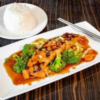 Salmon Teriyaki · Grilled salmon on steamed vegetable with house teriyaki sauce. serve with steamed rice.
