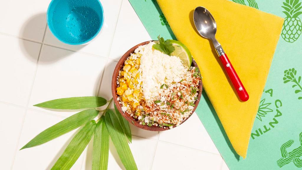 Esquites · Corn off the cob mixed with mayo, cotija, and chili powder.