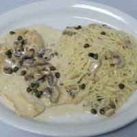 Pollo Limone · All-natural chicken breast sautéed in our homemade lemon, butter, caper and mushroom cream s...