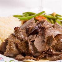Gyro Plate · Tender gyro meat served with warm pita bread + choice of rice or house salad + choice of 2 s...