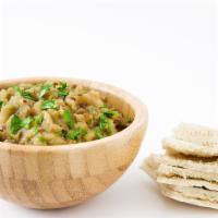 Baba Ghanoush With Pita · Eggplant based dip with traditional herbs and spices served with a warm pita.