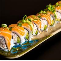 Washington Roll · 8 pieces. California roll with salmon on top.
