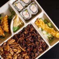 Chicken & Steak Bento Special · Chicken and steak, 4 pieces of California roll, 4 pieces of gyoza and 1 piece of shrimp.