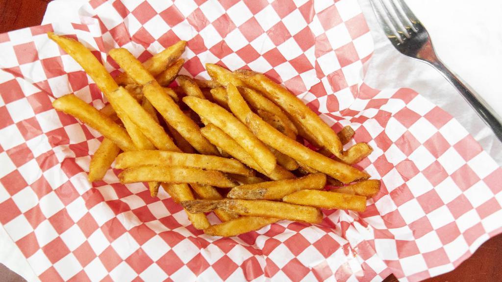Killer Seasoned Fries · Extra long cut fries coated with a zesty seasoning.