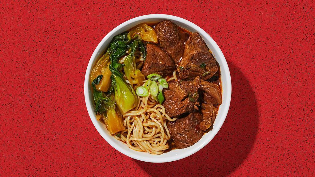 Beef Noodle Soup · Beef with thick noodles and bok choy in a beef based soup.