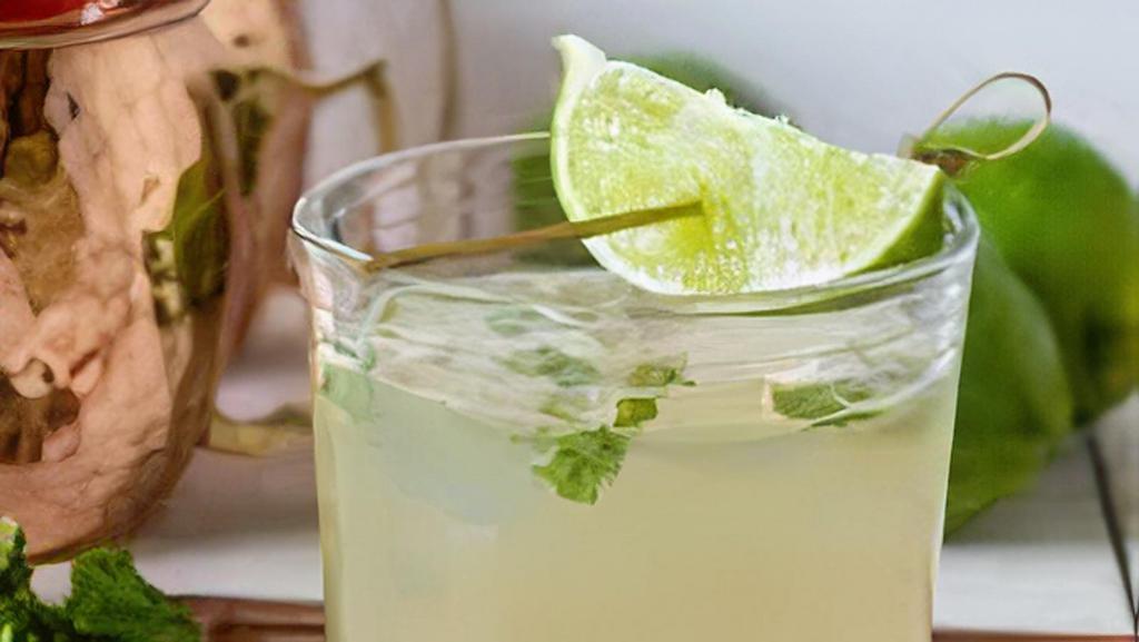 Moscow Mule · Vodka, Lime Juice, Ginger Beer over ice