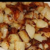 Fried Potatoes · Freshly peeled, diced, and fried seasoned potatoes