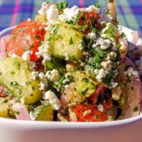 Cucumber, Tomato & Feta Salad · Cucumber, tomato, feta and red onion tossed with house vinaigrette