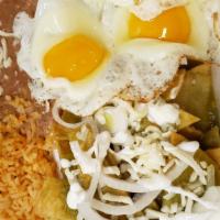 Chilaquiles · Deep fried tortilla chips smothered in either enchilada sauce (salsa roja) or green tomatill...