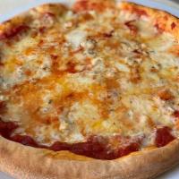 Four Cheese Heaven · Fresh tomato sauce, mozzarella cheese, Gorgonzola, Fontina, Parmesan.