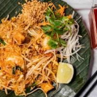 Pad Thai Noodle · Pan-fried rice noodles with your choice of meat, egg, ground peanuts, bean sprouts, and gree...