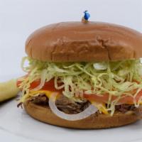 Crazy Chicken Sandwich · Slow cooked shredded chicken, American cheese, crisp lettuce, cold tomato, shaved onion on t...