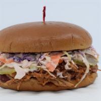 The Bbq Pulled Pork · Pulled pork rubbed with a blend of spices, slow-cooked and smoked with natural hickory, mixe...